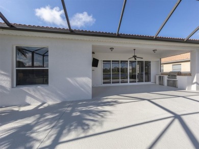 This stunning WCI-built  home offers a picturesque view from on Venetian Golf and River Club in Florida - for sale on GolfHomes.com, golf home, golf lot