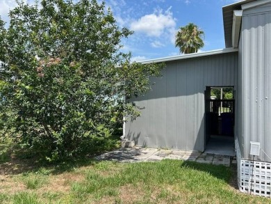 LOVELY DOUBLE-WIDE!  LARGE FRONT LANAI!  TURNKEY! FURNISHED on Wedgewood Golf Club in Florida - for sale on GolfHomes.com, golf home, golf lot