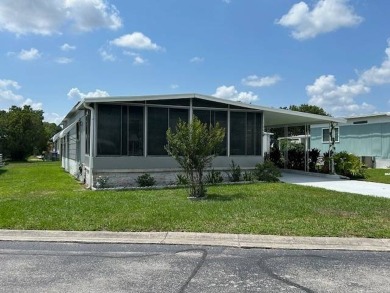 LOVELY DOUBLE-WIDE!  LARGE FRONT LANAI!  TURNKEY! FURNISHED on Wedgewood Golf Club in Florida - for sale on GolfHomes.com, golf home, golf lot