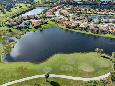 This stunning WCI-built  home offers a picturesque view from on Venetian Golf and River Club in Florida - for sale on GolfHomes.com, golf home, golf lot