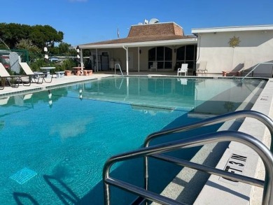 LOVELY DOUBLE-WIDE!  LARGE FRONT LANAI!  TURNKEY! FURNISHED on Wedgewood Golf Club in Florida - for sale on GolfHomes.com, golf home, golf lot