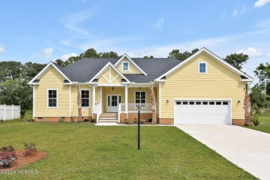 Welcome to your coastal sanctuary, where the tranquil shores of on Lockwood Folly Country Club in North Carolina - for sale on GolfHomes.com, golf home, golf lot