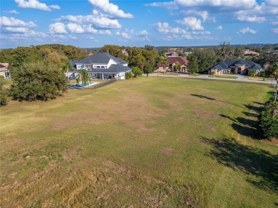 Under contract-accepting backup offers. Exclusive 1.09 Acre Lot on Lake Jovita Golf and Country Club in Florida - for sale on GolfHomes.com, golf home, golf lot