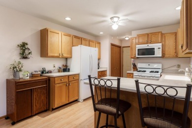 Sought-after end-unit condo overlooking Beautiful Krueger Golf on Krueger-Haskell Golf Course in Wisconsin - for sale on GolfHomes.com, golf home, golf lot