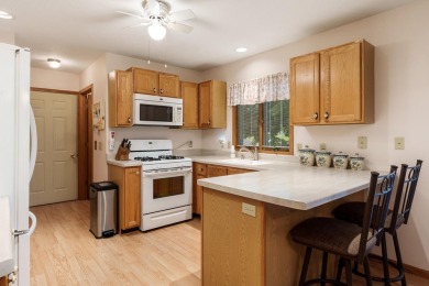 Sought-after end-unit condo overlooking Beautiful Krueger Golf on Krueger-Haskell Golf Course in Wisconsin - for sale on GolfHomes.com, golf home, golf lot
