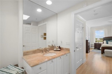 Step off of your private elevator and directly into this on West Bay Beach and Golf Club in Florida - for sale on GolfHomes.com, golf home, golf lot