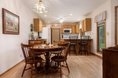 Sought-after end-unit condo overlooking Beautiful Krueger Golf on Krueger-Haskell Golf Course in Wisconsin - for sale on GolfHomes.com, golf home, golf lot