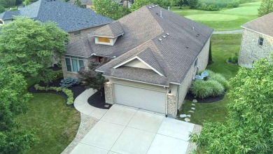 Experience luxury and privacy in this stunning Rhodes-built home on The Golf Club At Yankee Trace in Ohio - for sale on GolfHomes.com, golf home, golf lot