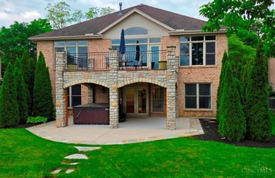Experience luxury and privacy in this stunning Rhodes-built home on The Golf Club At Yankee Trace in Ohio - for sale on GolfHomes.com, golf home, golf lot