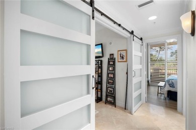 Step off of your private elevator and directly into this on West Bay Beach and Golf Club in Florida - for sale on GolfHomes.com, golf home, golf lot