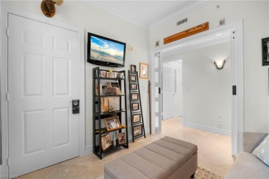 Step off of your private elevator and directly into this on West Bay Beach and Golf Club in Florida - for sale on GolfHomes.com, golf home, golf lot