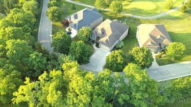 Experience luxury and privacy in this stunning Rhodes-built home on The Golf Club At Yankee Trace in Ohio - for sale on GolfHomes.com, golf home, golf lot