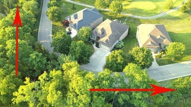 Experience luxury and privacy in this stunning Rhodes-built home on The Golf Club At Yankee Trace in Ohio - for sale on GolfHomes.com, golf home, golf lot