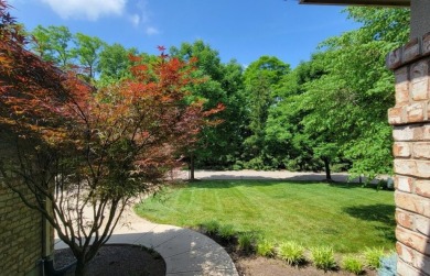 Experience luxury and privacy in this stunning Rhodes-built home on The Golf Club At Yankee Trace in Ohio - for sale on GolfHomes.com, golf home, golf lot