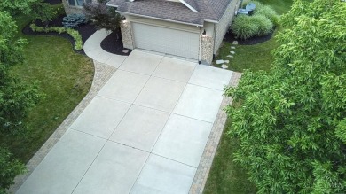 Experience luxury and privacy in this stunning Rhodes-built home on The Golf Club At Yankee Trace in Ohio - for sale on GolfHomes.com, golf home, golf lot