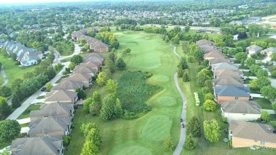 Experience luxury and privacy in this stunning Rhodes-built home on The Golf Club At Yankee Trace in Ohio - for sale on GolfHomes.com, golf home, golf lot