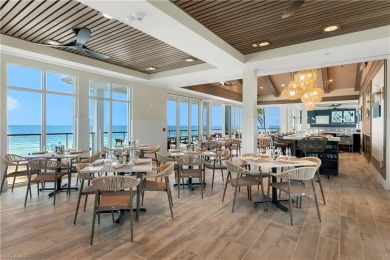 Step off of your private elevator and directly into this on West Bay Beach and Golf Club in Florida - for sale on GolfHomes.com, golf home, golf lot