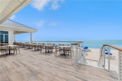 Step off of your private elevator and directly into this on West Bay Beach and Golf Club in Florida - for sale on GolfHomes.com, golf home, golf lot