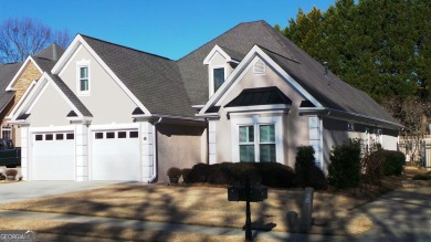 THIS BEAUTIFUL 1.5 STORY STUCCO HOME BEHIND THE GATES OF THE on Eagles Landing Country Club in Georgia - for sale on GolfHomes.com, golf home, golf lot