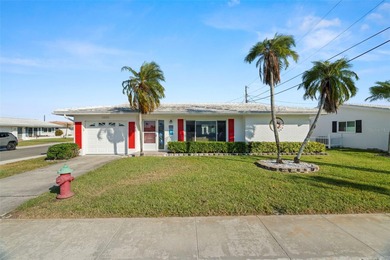 Well kept & Solid - FAIRFAX Model Corner-Lot home with 1682 on Mainlands Golf Club in Florida - for sale on GolfHomes.com, golf home, golf lot