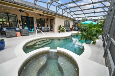 Experience breathtaking panoramic WATER VIEWS with a serene on Stonegate Golf Club in Florida - for sale on GolfHomes.com, golf home, golf lot