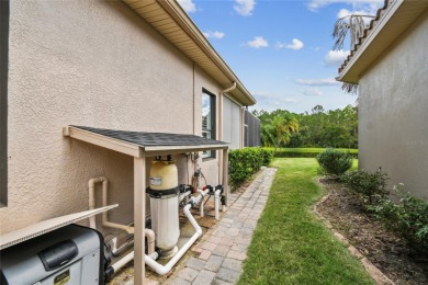 Experience breathtaking panoramic WATER VIEWS with a serene on Stonegate Golf Club in Florida - for sale on GolfHomes.com, golf home, golf lot