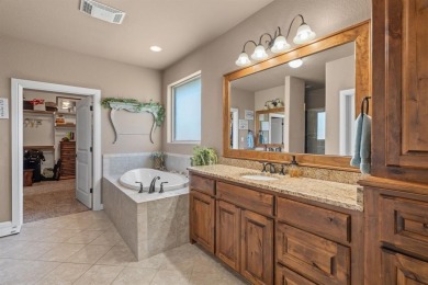 Beautifully maintained 4-bedroom, 2.5-bath home on a half-acre on Pecan Plantation Country Club in Texas - for sale on GolfHomes.com, golf home, golf lot