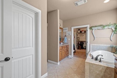 Beautifully maintained 4-bedroom, 2.5-bath home on a half-acre on Pecan Plantation Country Club in Texas - for sale on GolfHomes.com, golf home, golf lot