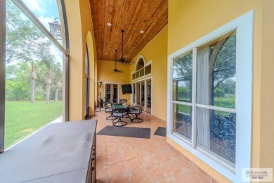 Tucked along the fairway in Rancho Escondido, this 4,037 sq ft on Rancho Viejo Resort and Country Club in Texas - for sale on GolfHomes.com, golf home, golf lot