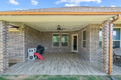 Beautifully maintained 4-bedroom, 2.5-bath home on a half-acre on Pecan Plantation Country Club in Texas - for sale on GolfHomes.com, golf home, golf lot