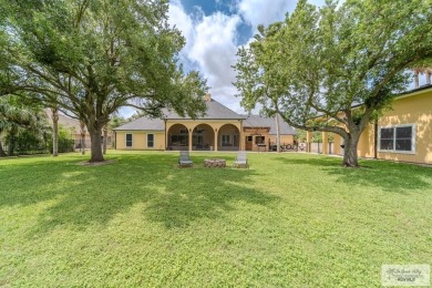 Tucked along the fairway in Rancho Escondido, this 4,037 sq ft on Rancho Viejo Resort and Country Club in Texas - for sale on GolfHomes.com, golf home, golf lot