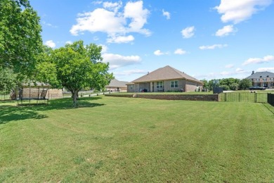Beautifully maintained 4-bedroom, 2.5-bath home on a half-acre on Pecan Plantation Country Club in Texas - for sale on GolfHomes.com, golf home, golf lot
