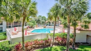 Experience luxury living at 419 Brackenwood Lane South, a on PGA National Golf Club in Florida - for sale on GolfHomes.com, golf home, golf lot