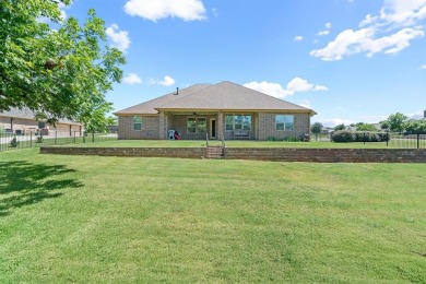 Beautifully maintained 4-bedroom, 2.5-bath home on a half-acre on Pecan Plantation Country Club in Texas - for sale on GolfHomes.com, golf home, golf lot