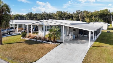 Looking for a winter getaway or the perfect warm-weather retreat on Betmar Acres Golf Club in Florida - for sale on GolfHomes.com, golf home, golf lot
