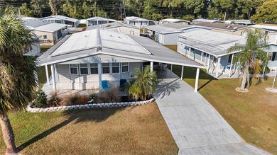 Looking for a winter getaway or the perfect warm-weather retreat on Betmar Acres Golf Club in Florida - for sale on GolfHomes.com, golf home, golf lot