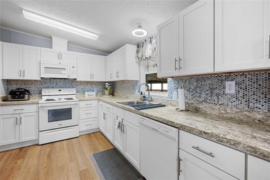 Looking for a winter getaway or the perfect warm-weather retreat on Betmar Acres Golf Club in Florida - for sale on GolfHomes.com, golf home, golf lot