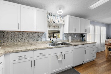 Looking for a winter getaway or the perfect warm-weather retreat on Betmar Acres Golf Club in Florida - for sale on GolfHomes.com, golf home, golf lot