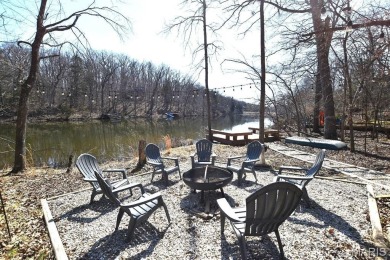 Welcome to this stylish, long time family-owned lakefront chalet on Innsbrook Resort Golf Course in Missouri - for sale on GolfHomes.com, golf home, golf lot