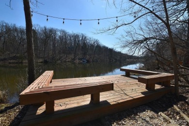 Welcome to this stylish, long time family-owned lakefront chalet on Innsbrook Resort Golf Course in Missouri - for sale on GolfHomes.com, golf home, golf lot