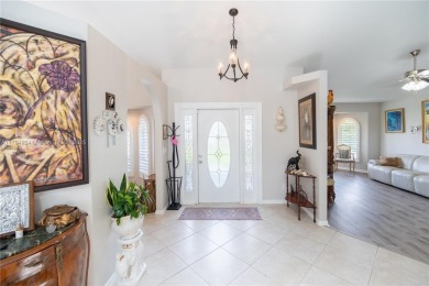 Stunning 4BR/4BA POOL HOME ideal for families and entertaining! on Sun n Lake Golf and Country Club in Florida - for sale on GolfHomes.com, golf home, golf lot