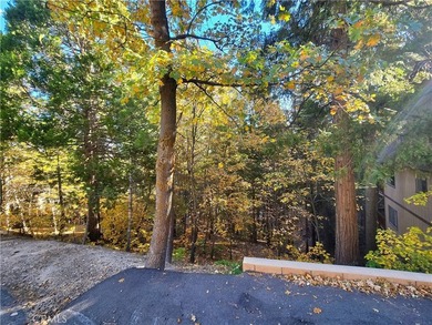 Discover the potential of this spacious and versatile vacant lot on Lake Arrowhead Country Club in California - for sale on GolfHomes.com, golf home, golf lot