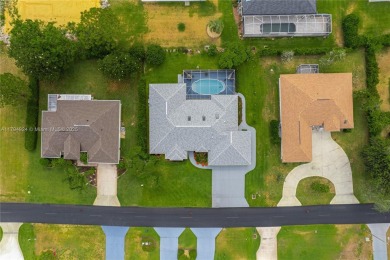 Stunning 4BR/4BA POOL HOME ideal for families and entertaining! on Sun n Lake Golf and Country Club in Florida - for sale on GolfHomes.com, golf home, golf lot