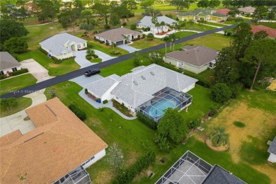 Stunning 4BR/4BA POOL HOME ideal for families and entertaining! on Sun n Lake Golf and Country Club in Florida - for sale on GolfHomes.com, golf home, golf lot