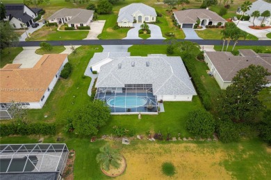 Stunning 4BR/4BA POOL HOME ideal for families and entertaining! on Sun n Lake Golf and Country Club in Florida - for sale on GolfHomes.com, golf home, golf lot