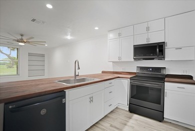 Enjoy effortless living in this stylishly renovated 2-bedroom, 1 on Rockport Country Club in Texas - for sale on GolfHomes.com, golf home, golf lot