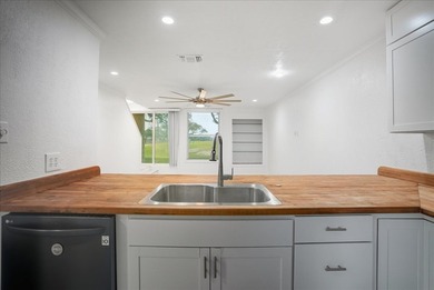 Enjoy effortless living in this stylishly renovated 2-bedroom, 1 on Rockport Country Club in Texas - for sale on GolfHomes.com, golf home, golf lot