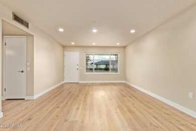 This stunning Sun City residence has been fully remodeled and is on Sun City Lakes West and East in Arizona - for sale on GolfHomes.com, golf home, golf lot