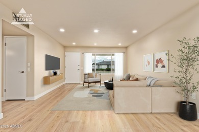 This stunning Sun City residence has been fully remodeled and is on Sun City Lakes West and East in Arizona - for sale on GolfHomes.com, golf home, golf lot