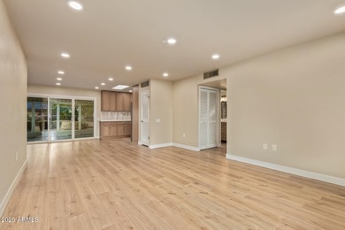 This stunning Sun City residence has been fully remodeled and is on Sun City Lakes West and East in Arizona - for sale on GolfHomes.com, golf home, golf lot